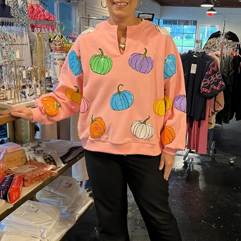 

A Pink Pumpkin Sequined Sweatshirt with Fun Patterns for Women in The Autumn of 2025