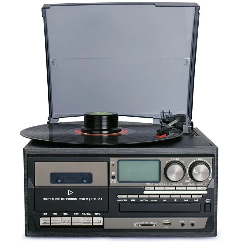 Vinyl record player, retro phonograph, old Bluetooth speaker.