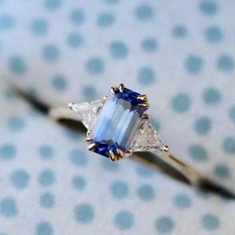 Rectangular Blue Zircon Three Stone Ring with Triangular Cutting Design on Both Sides, Trendy and Luxurious Commuting Jewelry