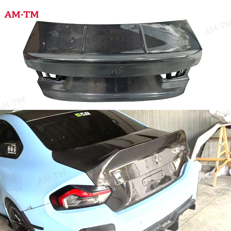 

For M2 G87 G42 2022+ Carbon fiber trunk lid the trunk lid encloses the upper lid behind the trunk lid the Upgrade body kit