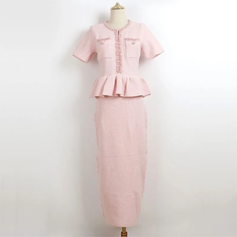   Vestido de punto elástico corto sin mangas 2025 Primavera/otoño/invierno vestido largo con borde de hoja de pescado vestido retro ceñido en la cintura