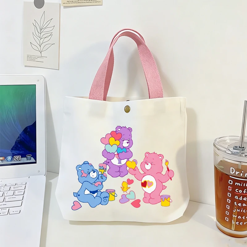 Bolsos de mano con diseño de ositos Cares, nuevos bolsos de lona para viaje y compras para mujer, bolsa de moda para estudiantes, regalo de cumpleaños para niñas, gran oferta