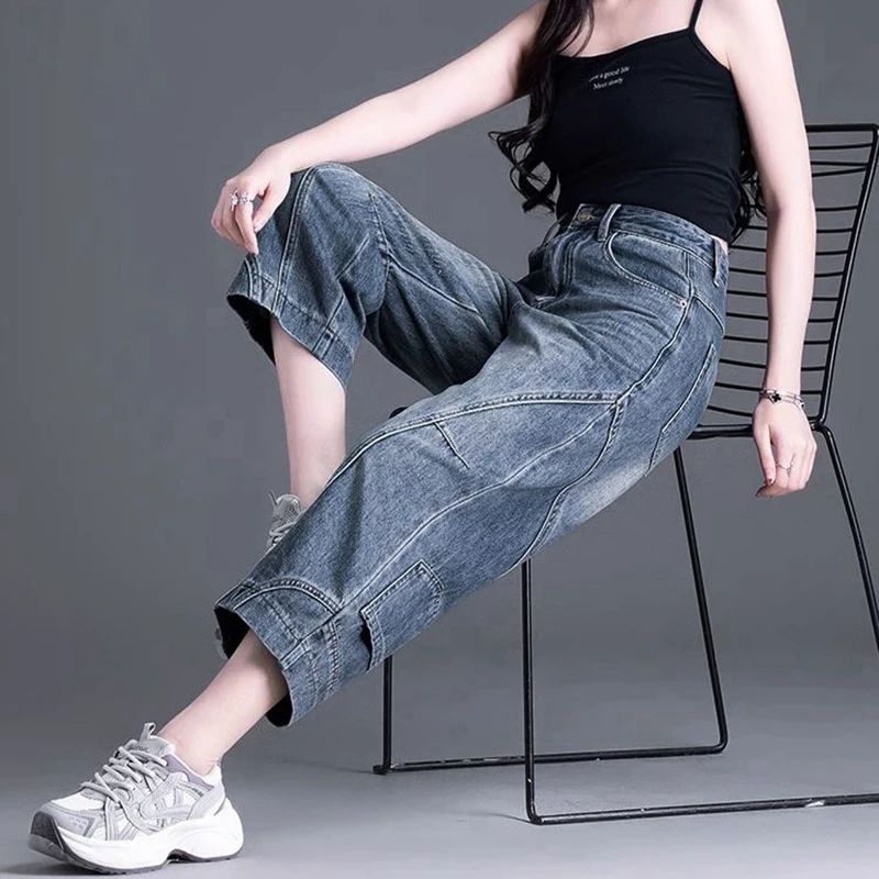 กางเกงยีนส์ทรงหลวมเอวสูง แฟชั่นทันสมัย ช่วยให้ดูผอมเพรียว เรียบง่าย ใช้งานได้หลากหลาย สไตล์เรโทร แต่งผ้าแบบปะติด ทรงขาบานกว้างแบบมีรอยตัดโค้งมน