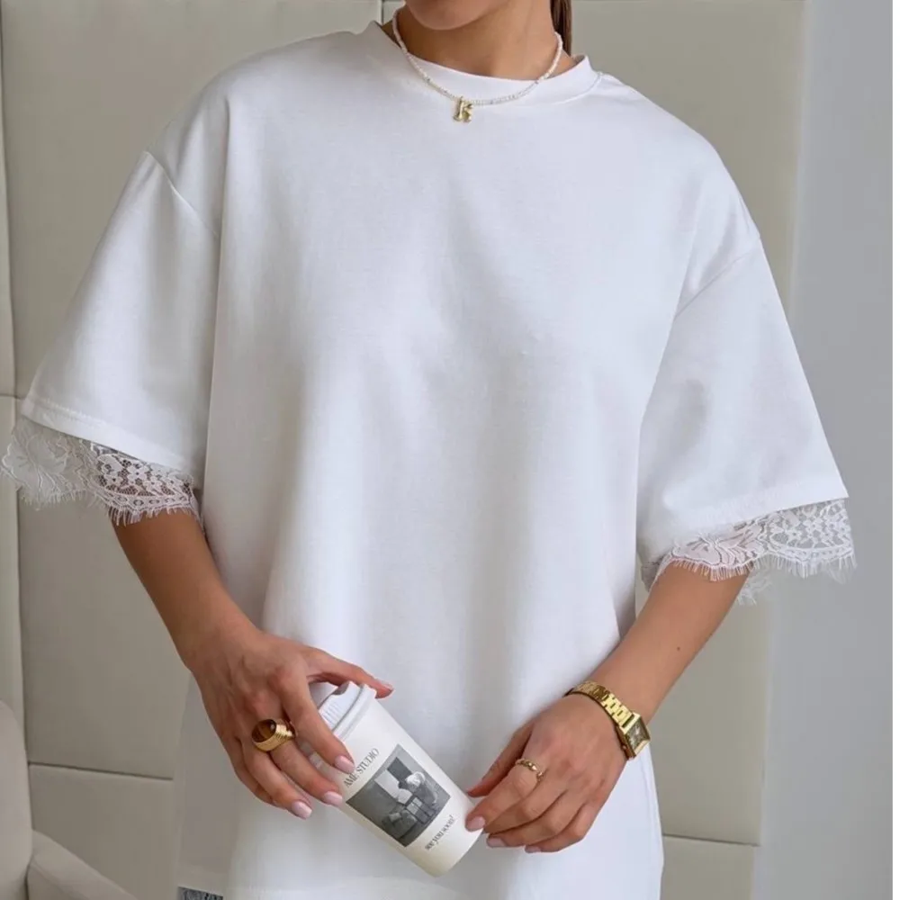 

Casual Retro T-shirt Fashionable Loose Solid Color Spring Summer Lace Patchwork Asymmetric Hem O-neck Slit Short-sleeved Shirt