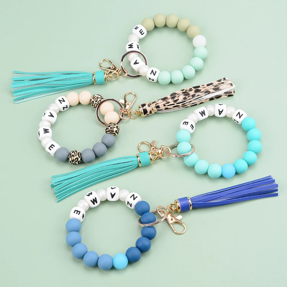 

Silicone Bead Bracelet Keychain, Round Polygon Elastic Key Ring Beaded Tassel Wrist DIY Kit