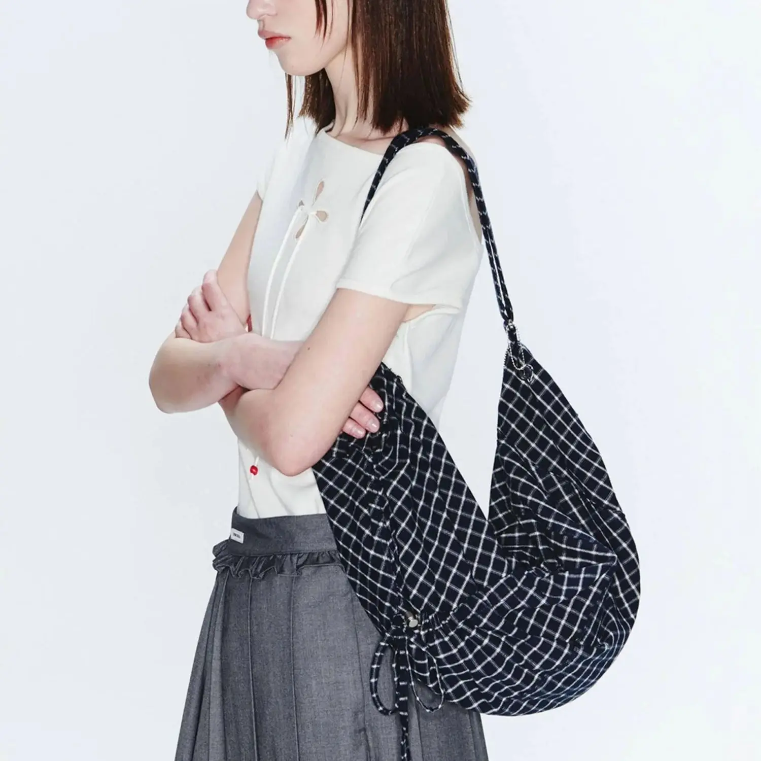slouchy-polka-dot-checked-frayed-one-shoulder-crossbody-tote-bag-with-charm-–-spacious-and-soft