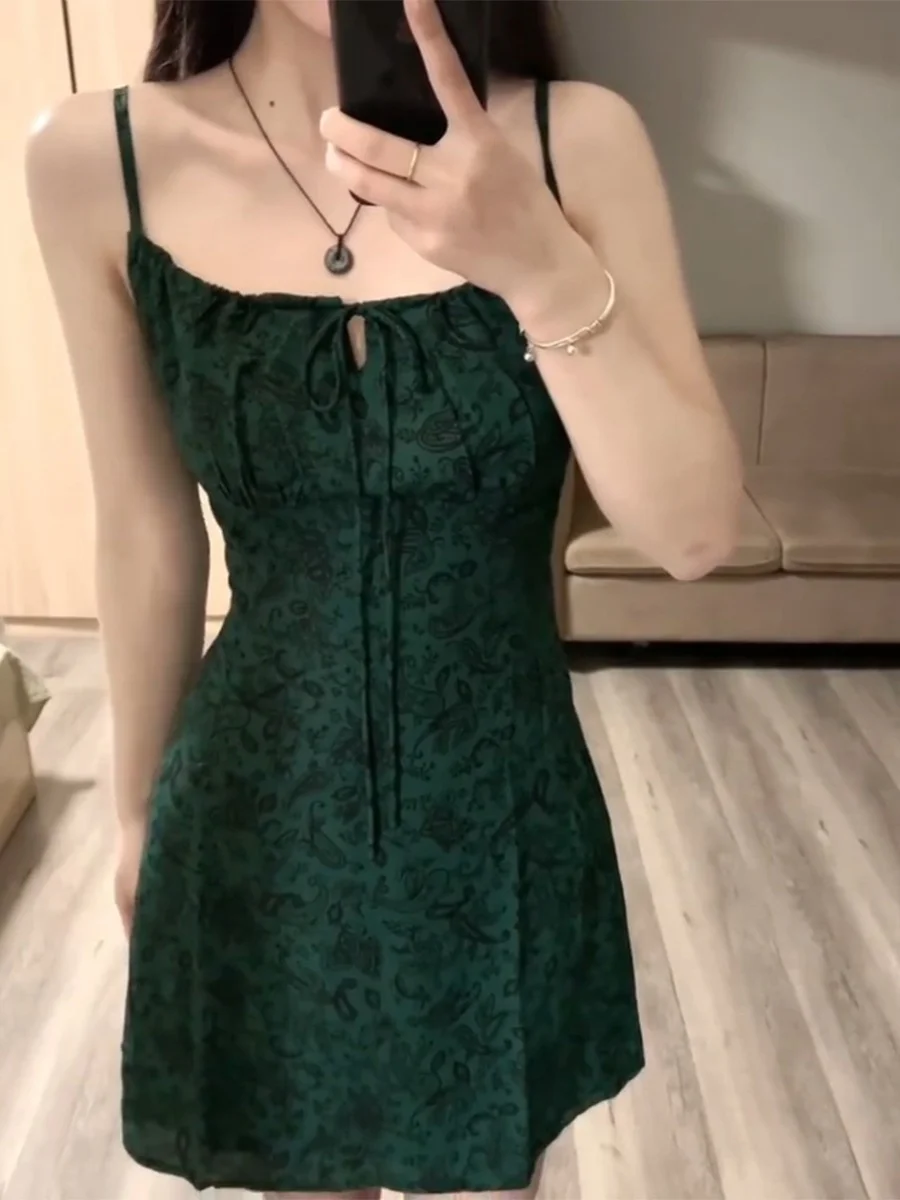 レトロな花柄プリントのホルターネックミディ丈ワンピース レディース 夏の新作 ベルト付き ウエストシェイプ スパイスビーチ バケーションワンピース