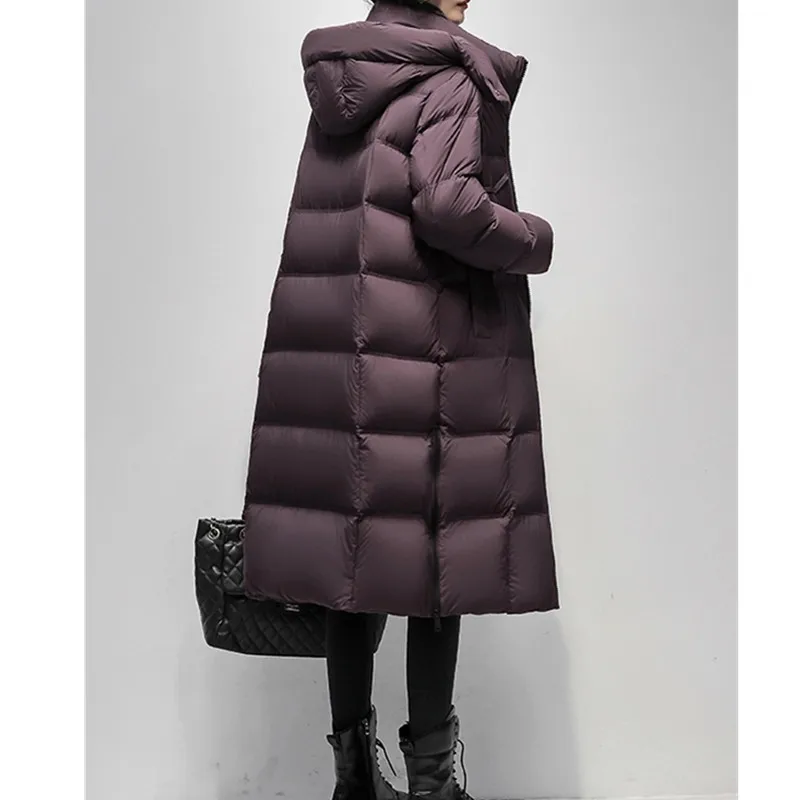 سترة شتوية للنساء 2026 النسخة الكورية الجديدة 90% معاطف بطة بيضاء أسفل مع قلنسوة معطف طويل مقاوم للرياح ومضاد للمطر