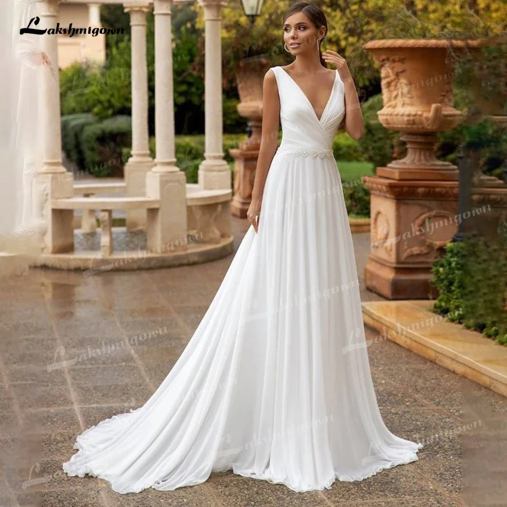 Semplice ed elegante spiaggia modesta bohémien doppio scollo a V abito da sposa da spiaggia abito da sposa in chiffon con perline abito da sposa con strascico