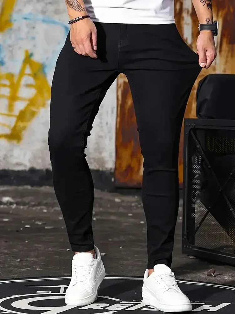 Pantalones vaqueros ajustados elásticos para hombre, Color sólido, negro, azul, primavera, calle de lujo, estilo Harajuku Hip-Hop, pantalones ajustados de marca