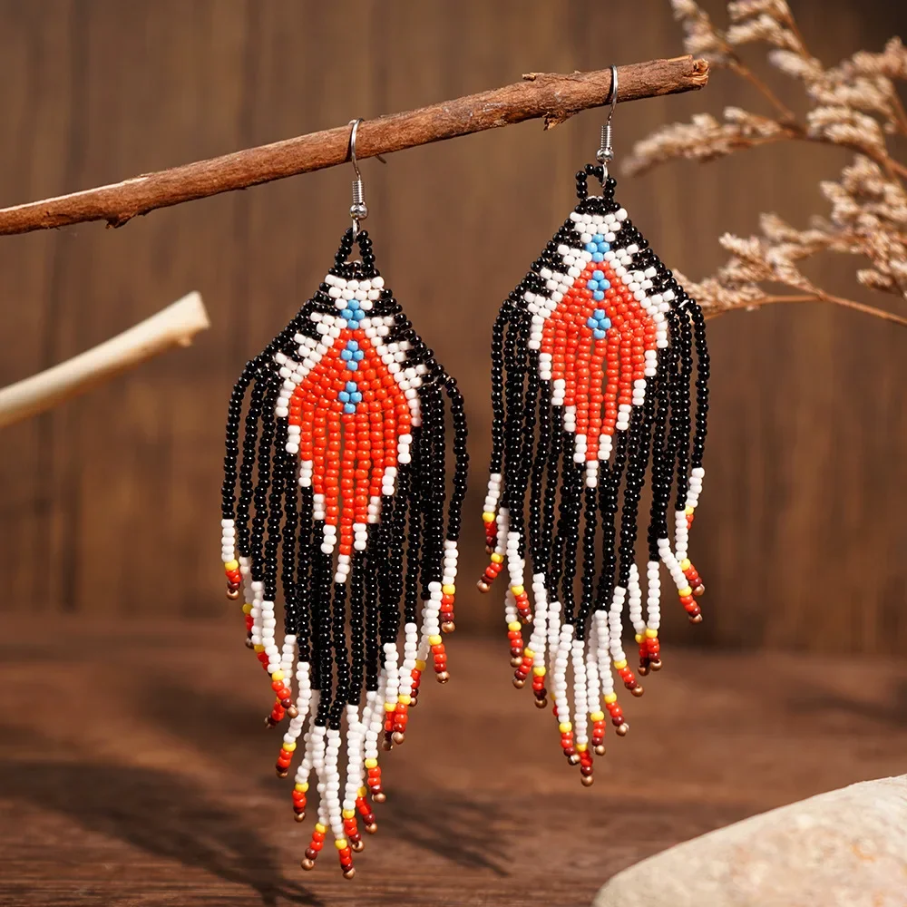 

Beaded earrings Tassel Geometry Design Originality Gradient Bohemia Hand knitting Alloy Tide Simple Rice bead earrings