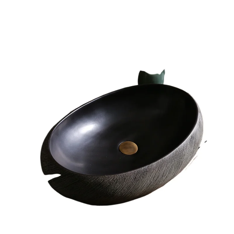 

Овальный умывальник большого размера на столе ретро, антикварный керамический умывальник китайский.