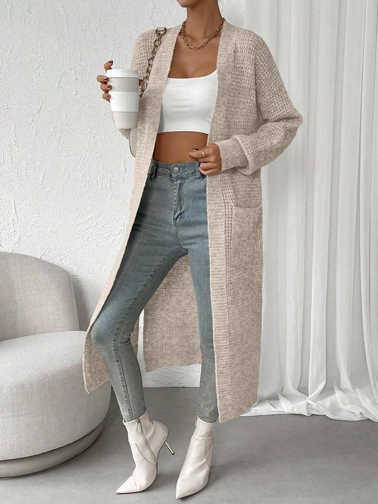 Damski sweter rozpinany z dekoltem w serek, ażurowy, modny i elegancki, monochromatyczny, średniej długości, top