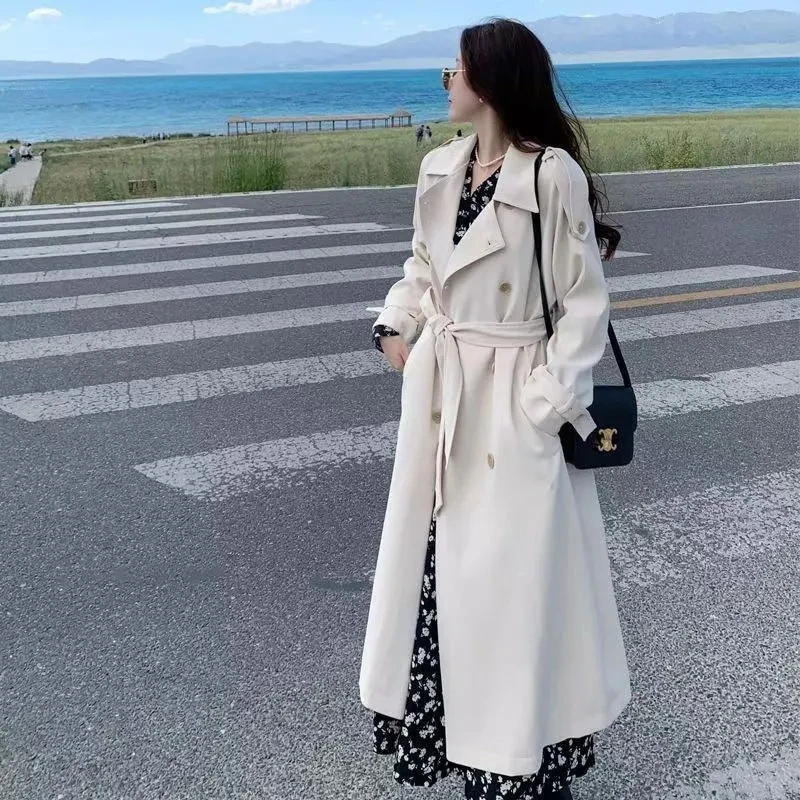 Primavera otoño señoras 2025 Popular mujer abrigo largo nuevo chaqueta cortavientos británica blanco pequeño gabardina femenina abrigo