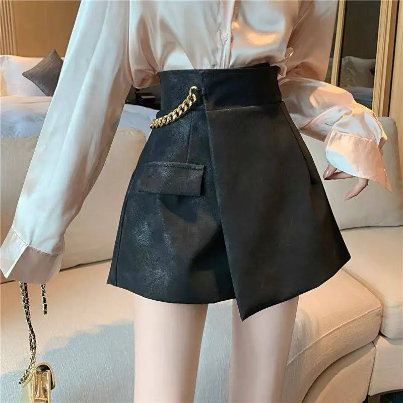 Irregular leather shorts women's autumn and winter design sense niche casual wide-leg pants slim Joker khaki skirt pants.