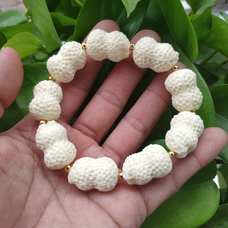 

Ivory Nut Carved Bracelet Guanyin the Eighteen Disciples of the Buddha Wealth Source Guangjin Bracelet Fortune Golden Toad Purse