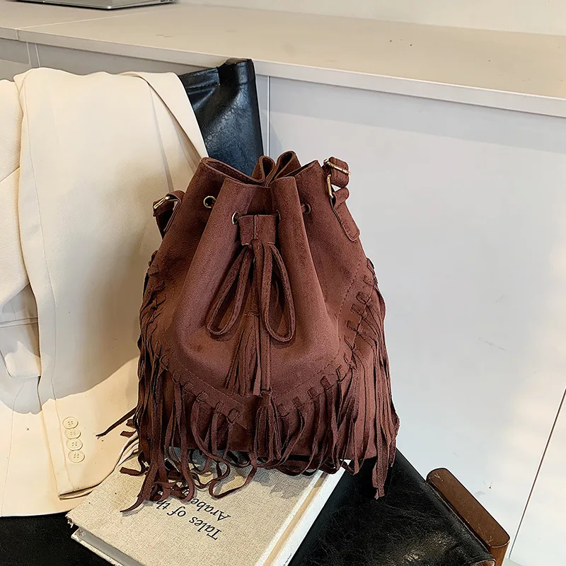 

New Stylish Women's Bag. Simple and Retro Suede Fringe Bucket Bag, Can Be Used As A Single-shoulder or Crossbody Bag.