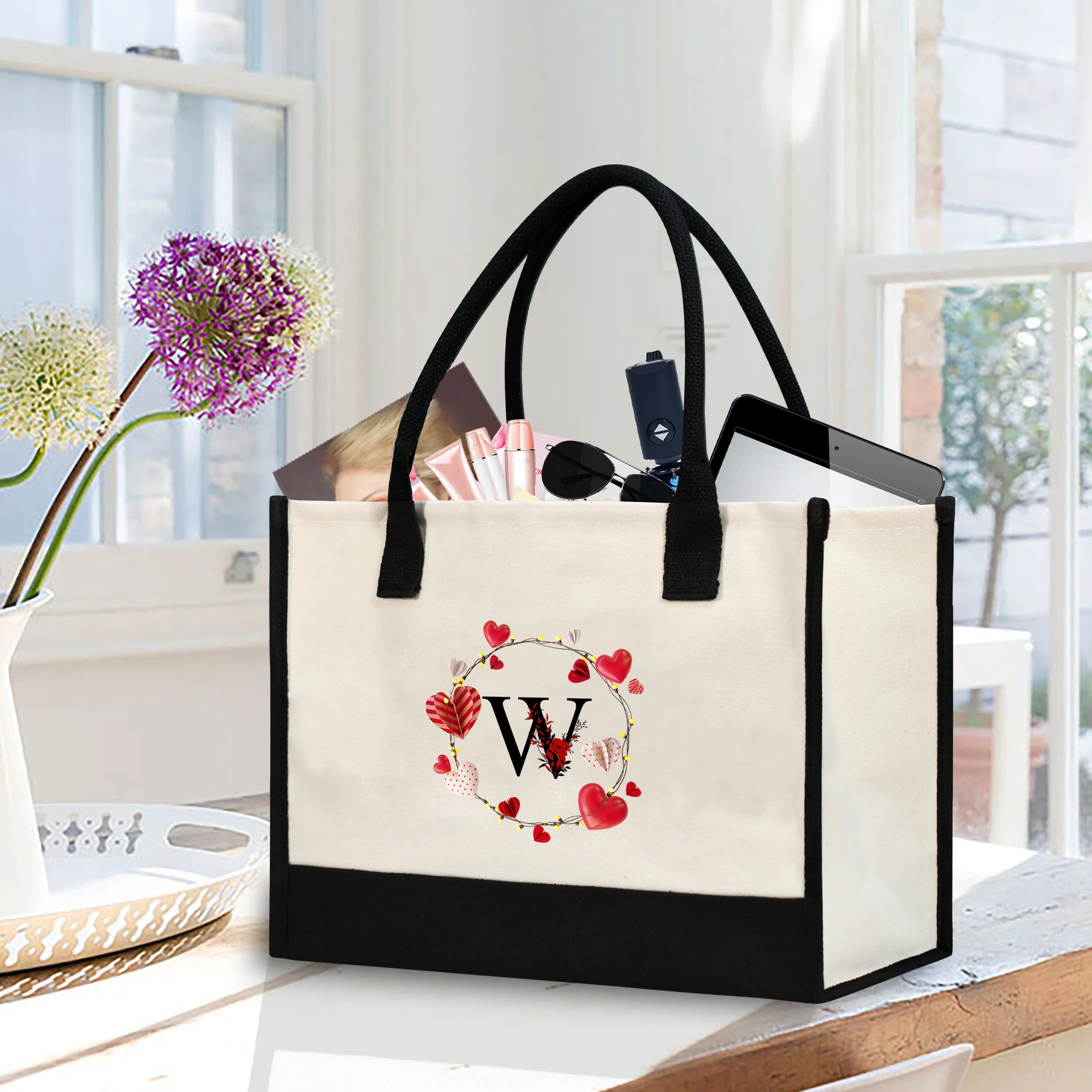 Love red flower hot stamping letter printed women's handbag, with a large capacity waterproof leisure commuter bag inside