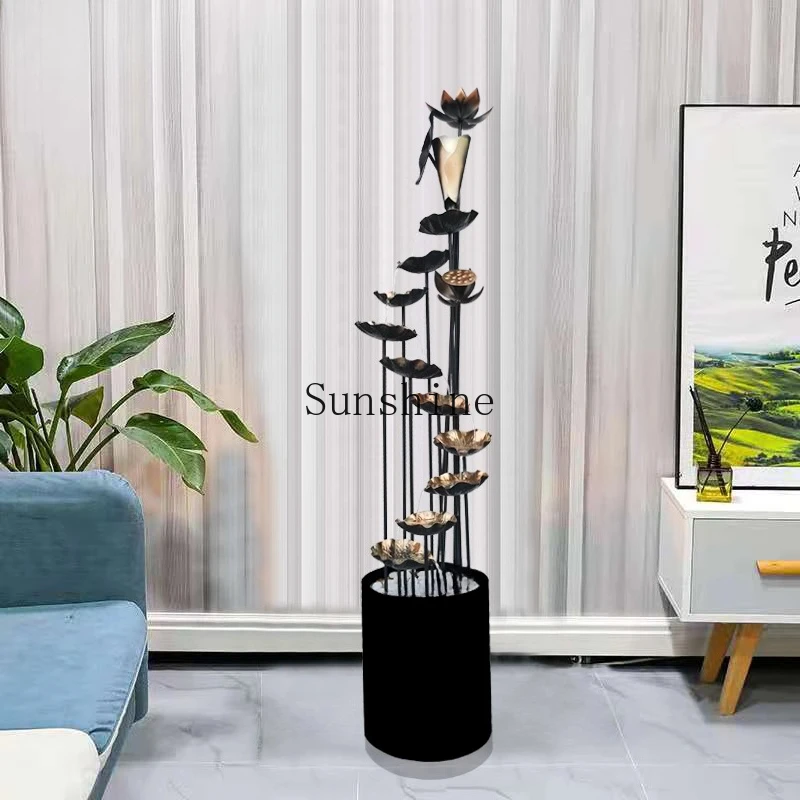 

TV cabinet next to the flowing fountain landscape indoor high-end light luxury floor living room decoration