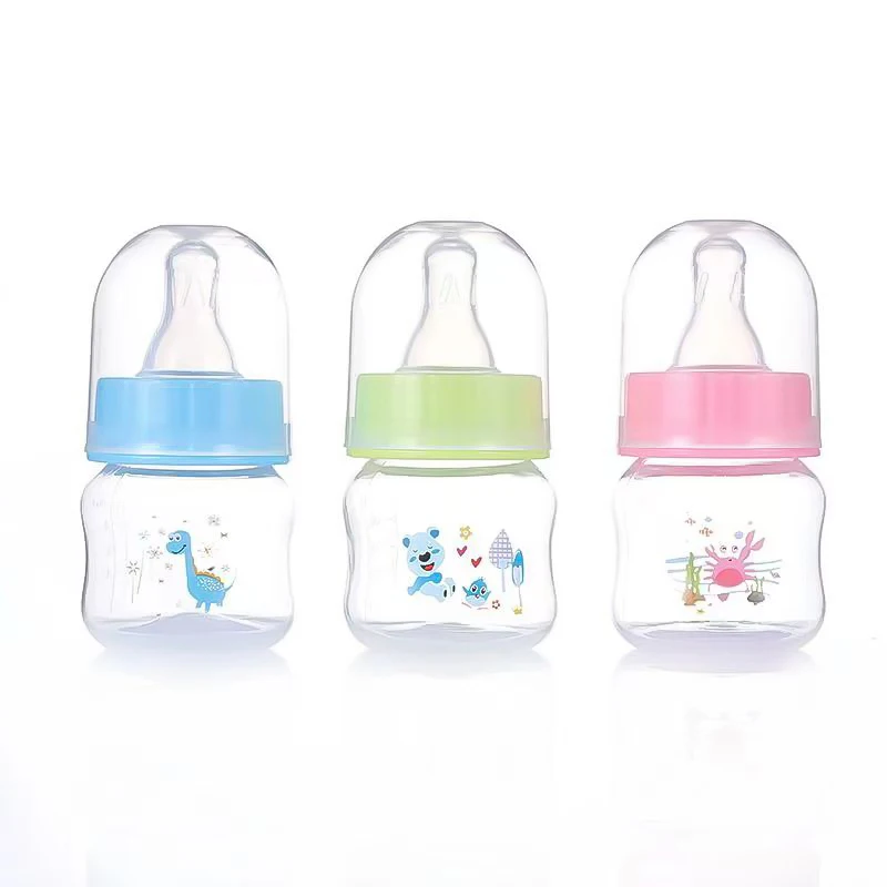 60ML standard caliber anti colic newborn milk bottle, made of safe PP material, soft pacifier, randomly printed, BPA free