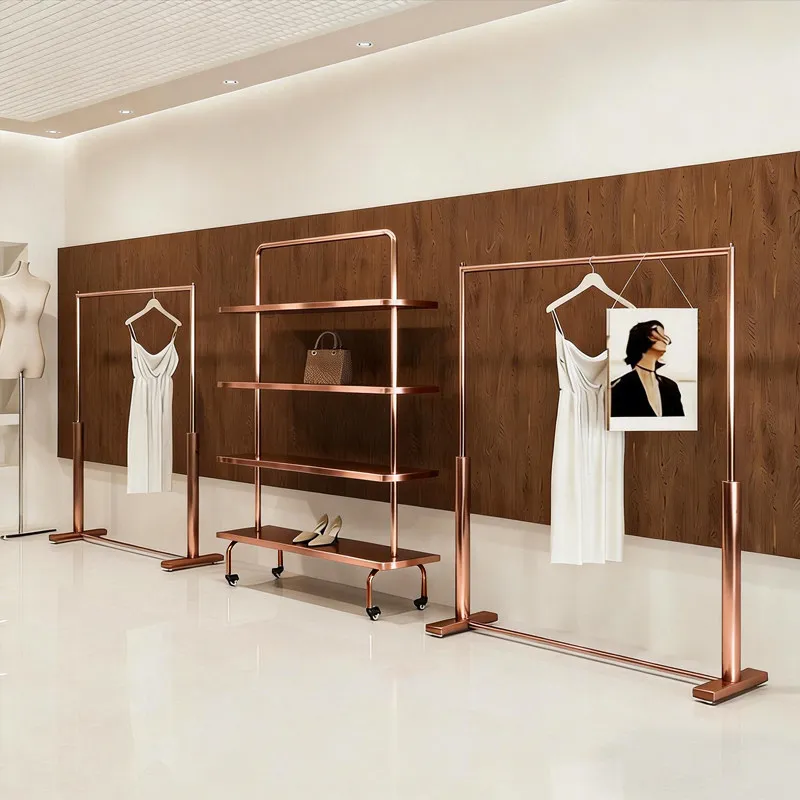 

Стеллаж для демонстрации одежды Nakajima из нержавеющей стали цвета розового золота, специальный демонстрационный стеллаж для мужской и женской одежды.