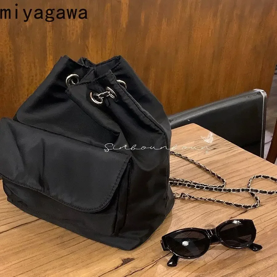 Miyagawa 2023 New Korean Edition Fashion Simple Strap Commuter Black Drawstring Chain Backpack for Women Fashion Backpacks