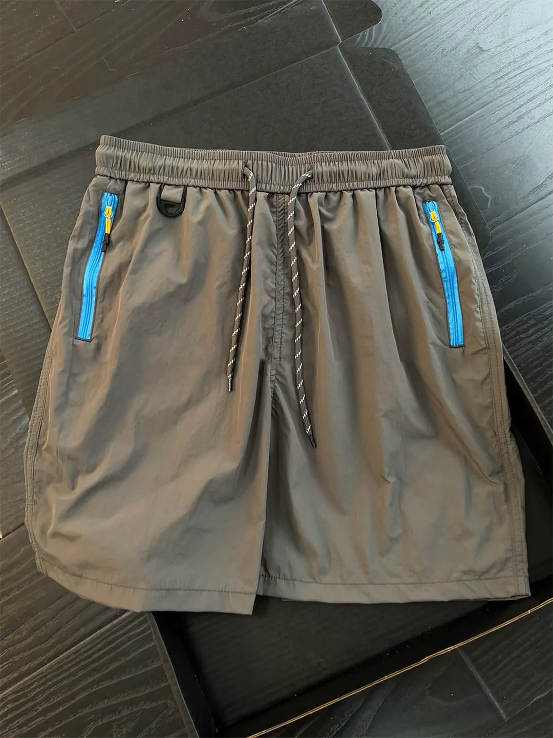 

Quick Dry Nylon Shorts Unisex Summer Outdoor Fitness Cycling Five-Quarter Length Casual Loose Fit Sports Shorts for Men And W...