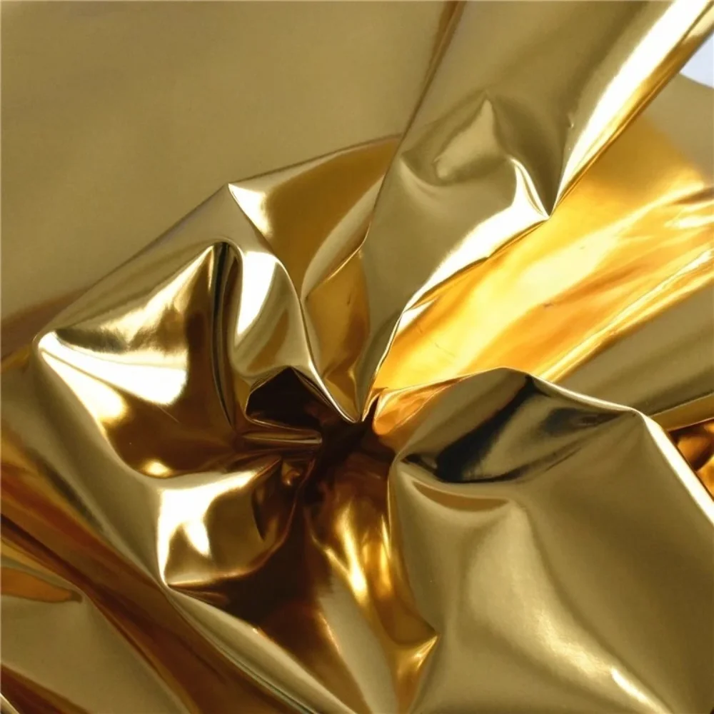 

Яркая золотистая зеркальная бархатная ткань с ПУ-покрытием, светоотражающая, для одежды, сумок, водонепроницаемая, для свадебного фона, кожаная ткань