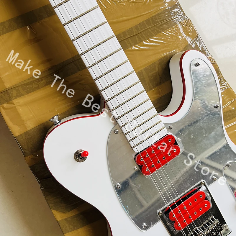 Pure white bright colored electric guitar, exquisite red pickup, quality assurance, fast delivery.