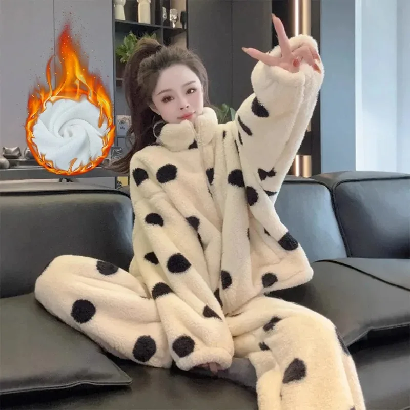 Keep warm and cozy in this polka dot coral fleece pajama set, with a loose fit, perfect for lounging around the house.
