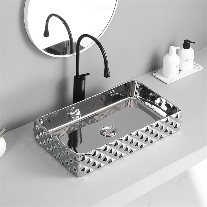 

Integrated Tabletop Basin Electroplated Washbasin Rectangular Household Hotel Engineering Ceramic Art Wash Basin 600*340*110mm