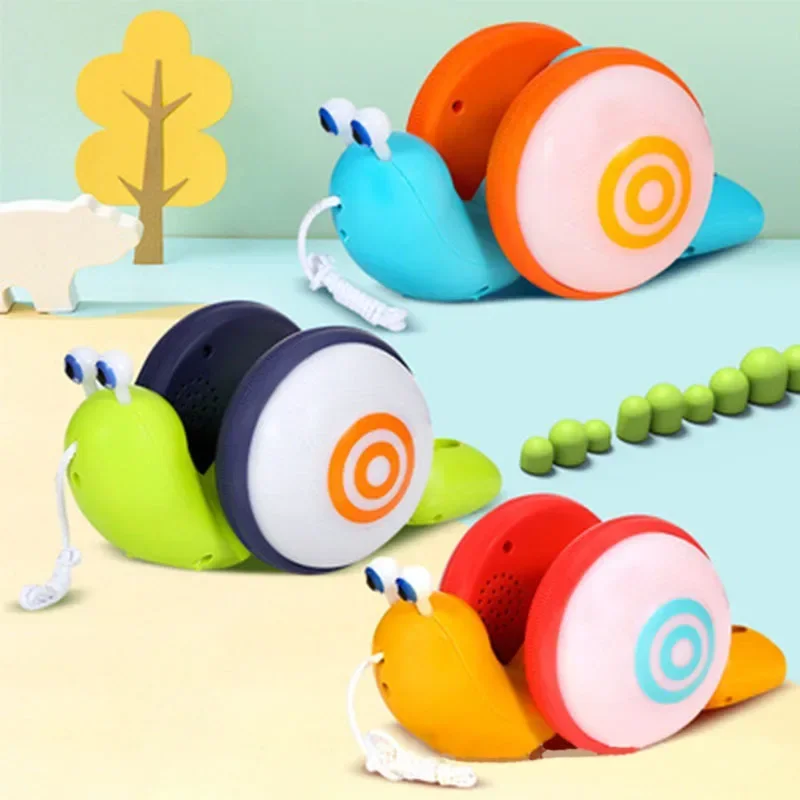 

Pull String Cartoon Snail Car Toy Baby Learn To Crawl&Pull Toy with Light&Music Children's Early Education Toys Baby Toddler Toy