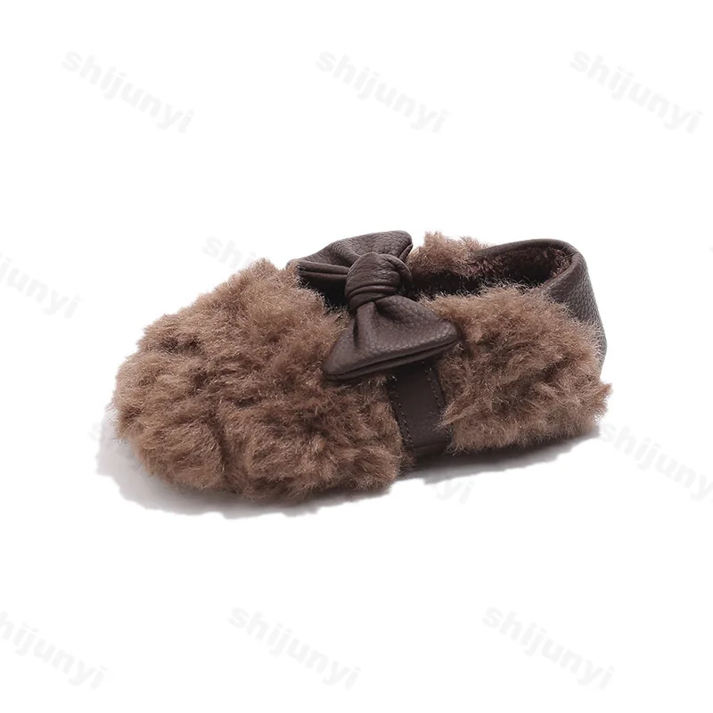 Scarpe da ragazza in cotone 2025 nuova moda Bowknot spessa pelliccia calda peluche scarpe casual per bambini appartamenti per bambini semplici scarpe casual invernali