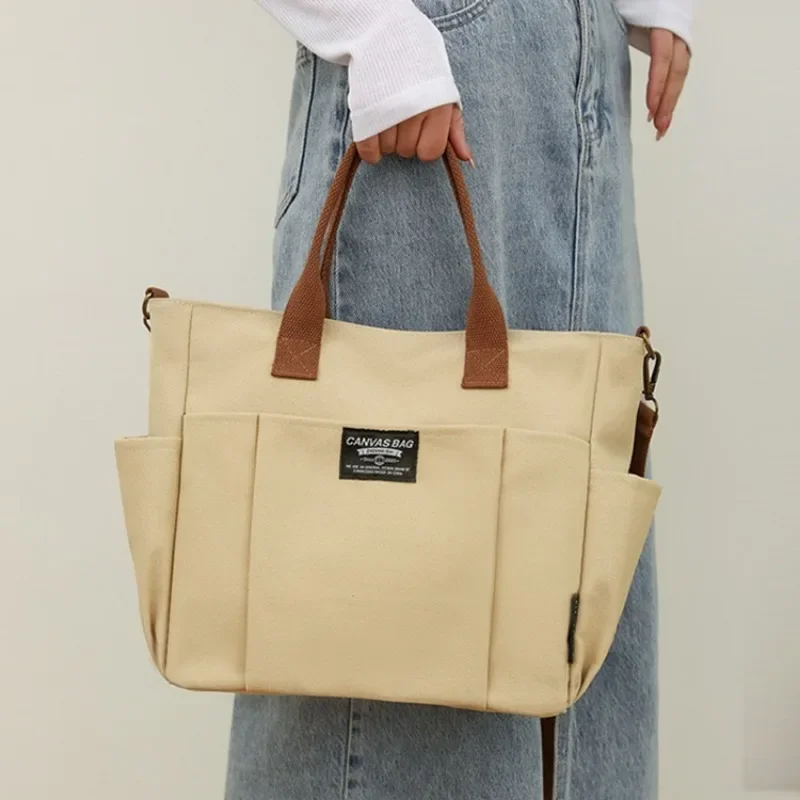 Bolso de lona minimalista urbano para mujer, bolsa de mano portátil cruzada Diagonal de un solo hombro, gran capacidad, viaje Horizontal, estudiante, nuevo