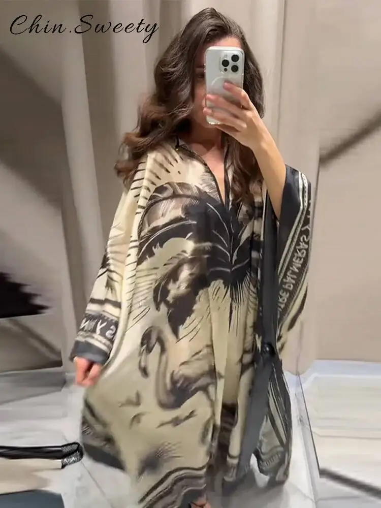 فستان أنيق مطبوع طويل مطوي للنساء فضفاض برقبة دائرية وأكمام طويلة فساتين الحفلات 2025 صيفي للسيدات لقضاء العطلات على الشاطئ جديد