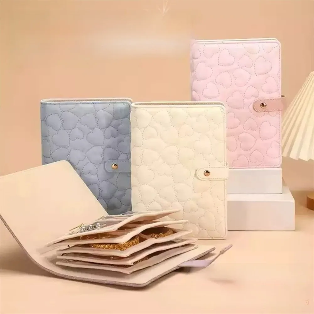 

Luxury Leather Jewelry Storage Book Love Heart Waterproof Necklace Binder Loose Leaf Partition Jewelry Packaging Brochure Travel