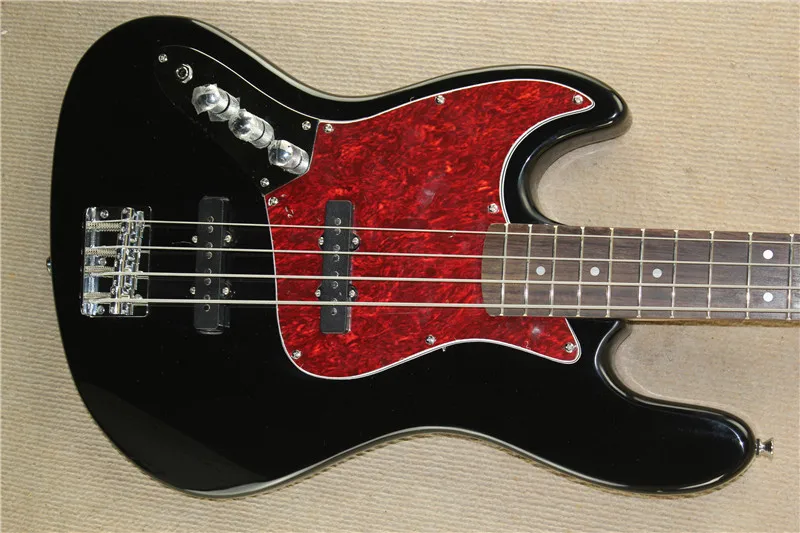 Four stringed left-handed electric bass black body left-handed exclusive bass