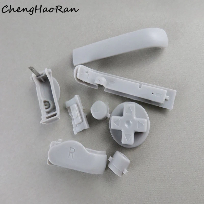 مجموعة واحدة مناسبة لوحدة التحكم في الألعاب بمفاتيح متقاطعة شفافة GBA LR AB ملحقات بديلة