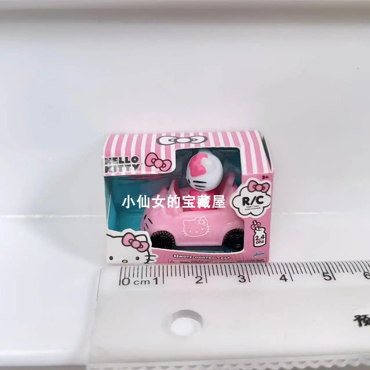 Cartoon Figurine Hello Kitty Mini RC Car 1:64 Scale Cute Pink Vehicle Anime Figure Character Toy Car Action Figure Collection view 5