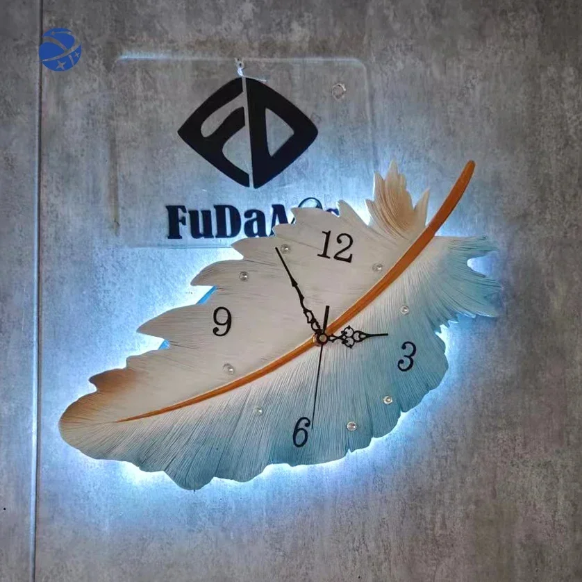 24X50 ไม่มีแสง dropshipping ผลิตภัณฑ์ 2024 โมเดิร์นหรูหราเรซิ่นผนังตกแต่ง Feather Shape Wall นาฬิกาสําหรับ Home House Decor