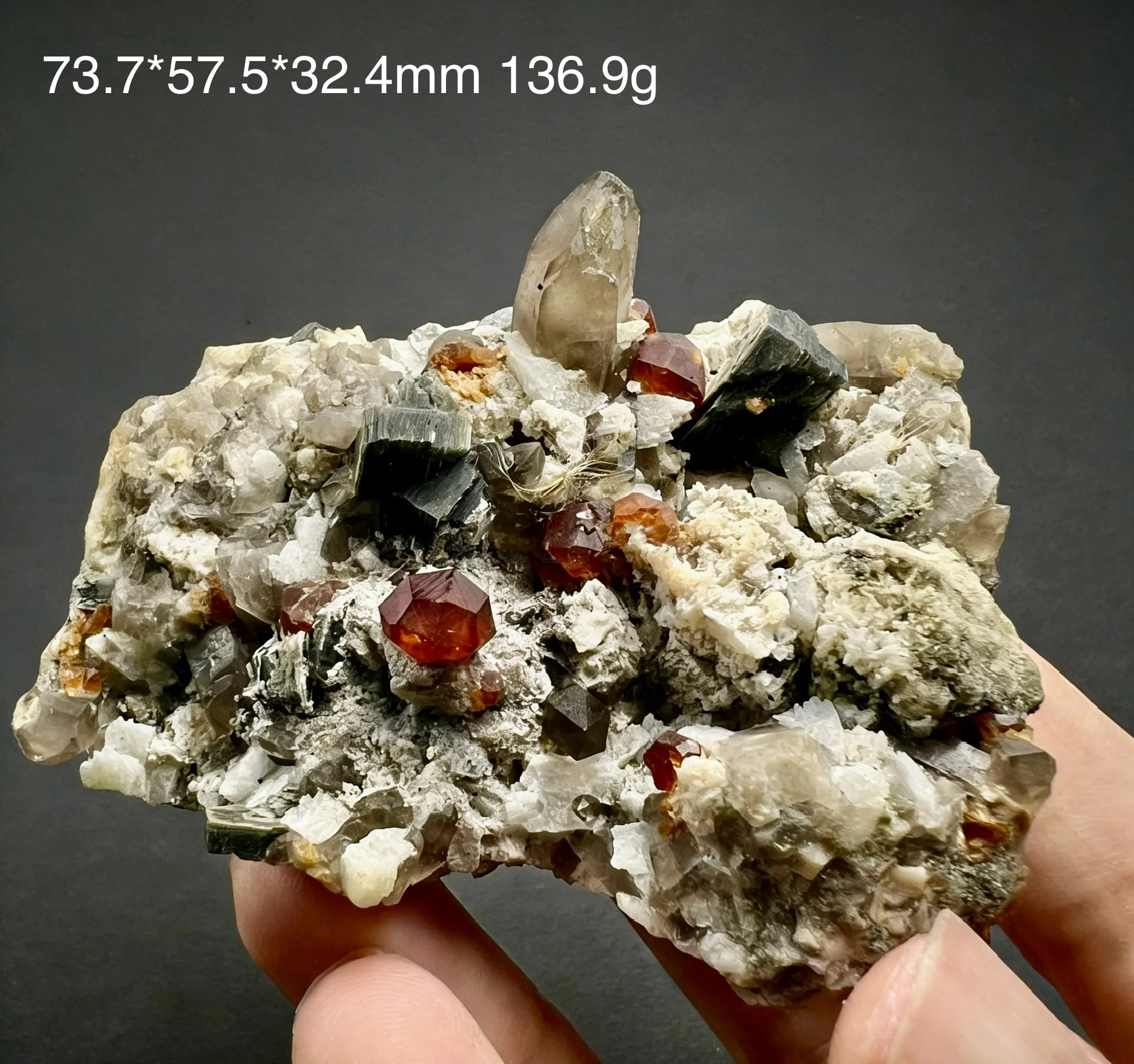 Selected natural Brazilian garnet associated mineral rough crystal specimen for appreciation, collection and display.