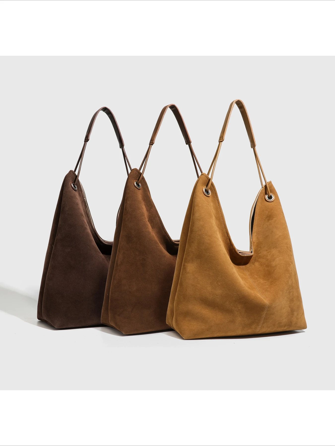 

2025 autumn and winter new retro color high sense women go out shoulder bucket bag