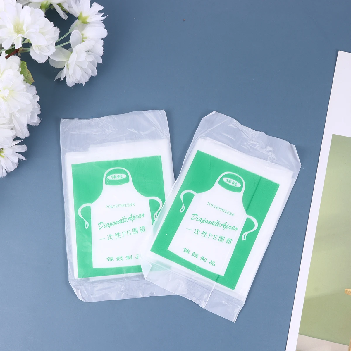 Grembiuli monouso impermeabili da 100 pezzi in plastica da cucina per bambini Aldult fuoriuscite gocce protezione macchie abbigliamento da officina