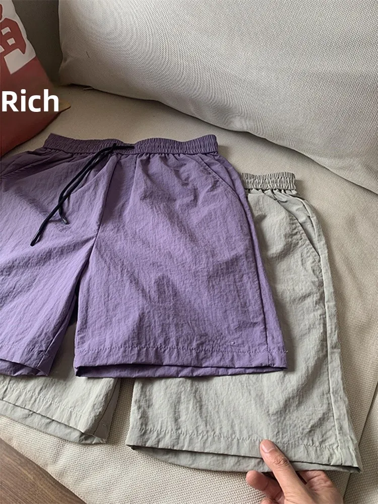 

Мужские спортивные брюки из ледяного шелка Qui Dry: летние, тонкие, укороченные (до колена), свободного кроя, молодежные, стильные