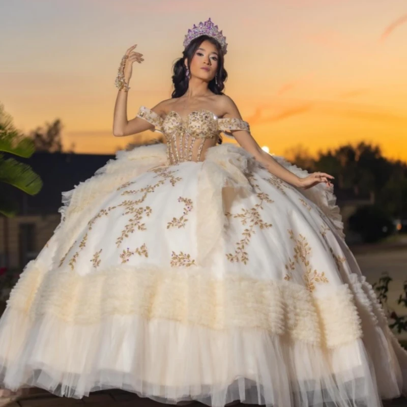 

Light Champagne Quinceanera Dresses Off Shoulder Ball Gown Sweet 16 Dress Gold Applique Bow Beading Crystal Bow Tull Birthday