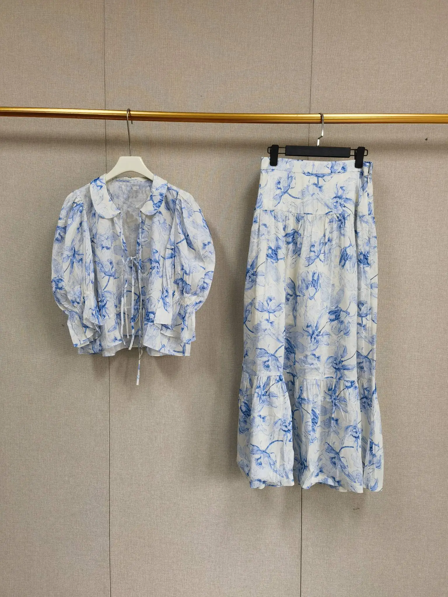 

2026 New Spring Women Blue Floral Printed Set Long Sleeve Lace-Up Spliced Ruffle + Long Skirt