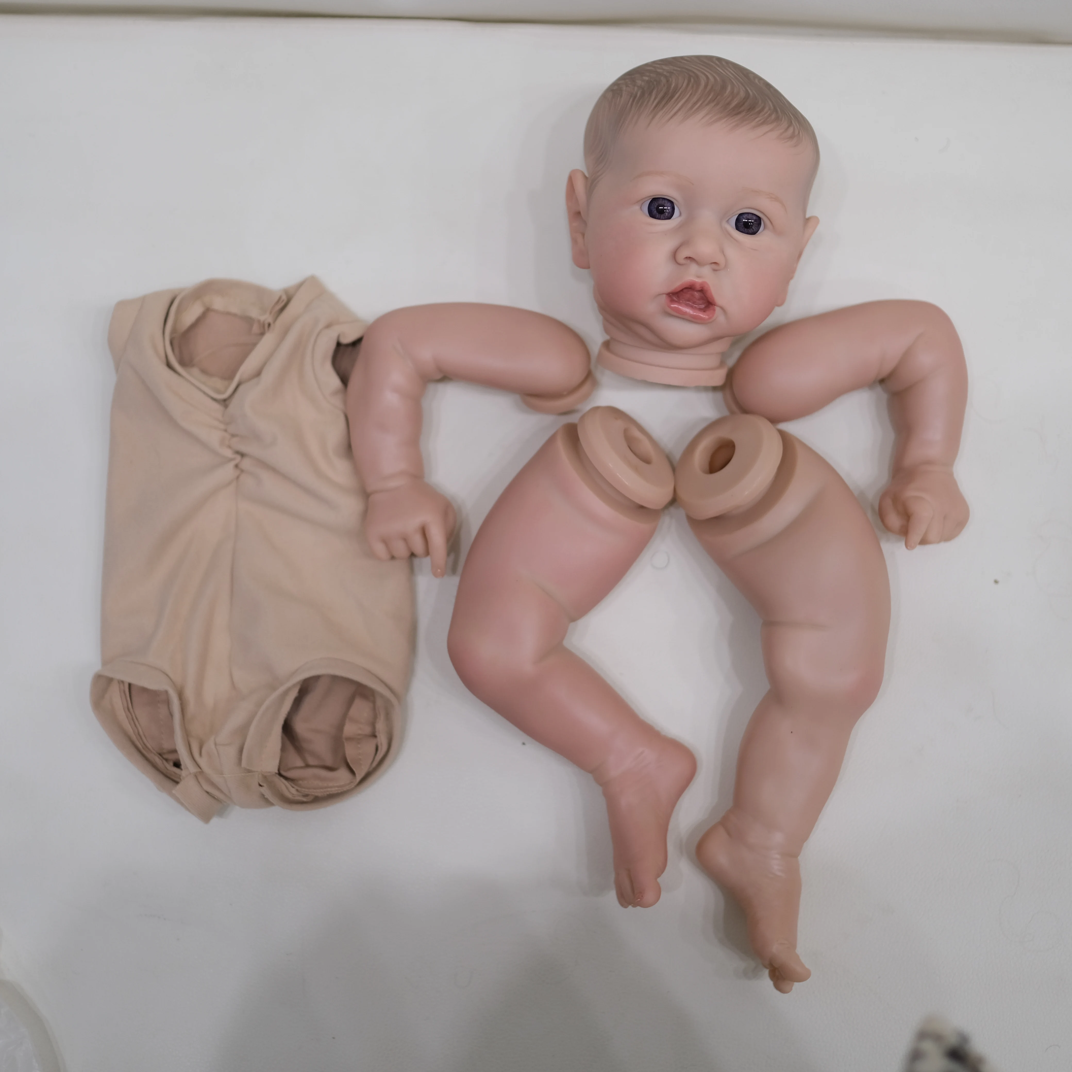 NPK 22inch Lifelike Reborn Doll Kit Saskia - Newborn Painted Unfinished Doll Parts with Hand Drawn Hair for Collectors