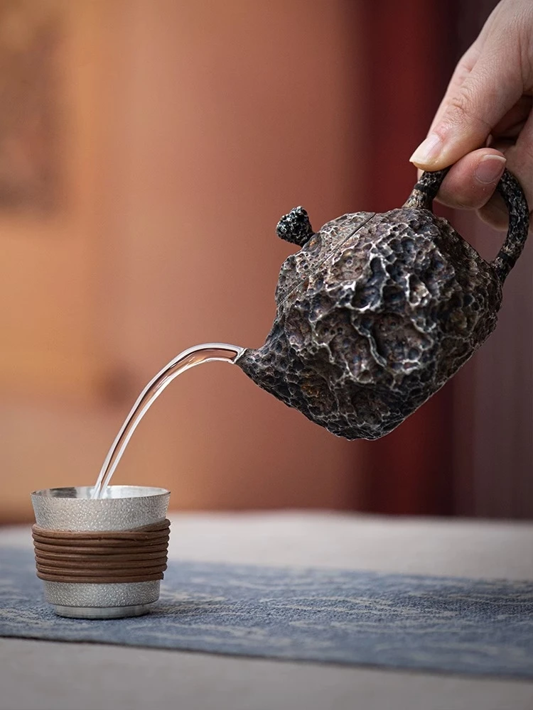 

Pure Silver 99.9% Tea Pot Handmade One Stone Pattern Insulated Silver Pot Meteorite Pit Wormhole Pot