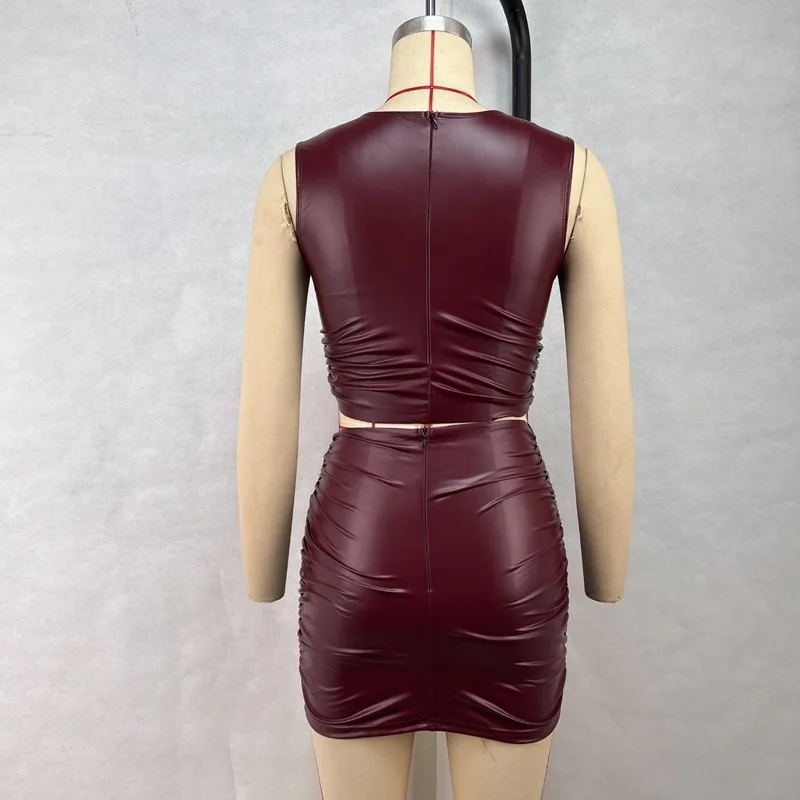Conjunto de dos piezas de moda para mujer, minifalda de cuero PU, sin mangas, falda plisada de media longitud