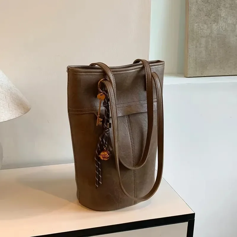 

Large Capacity High Quality Retro PU Bucket Shoulder Bags Simple Sense of Luxury Popularity Versatile Women's Handbags 2025 New